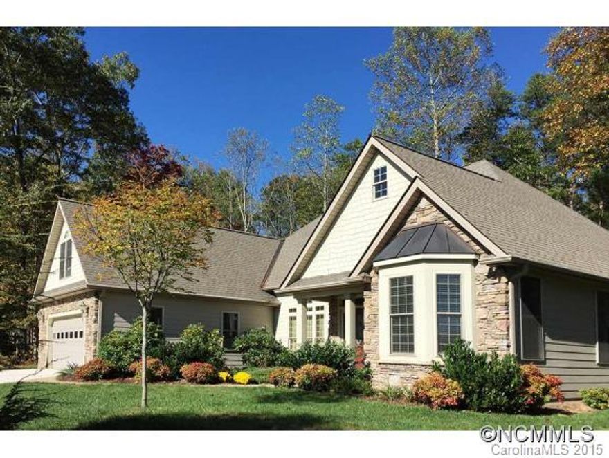 Cathedral ceiling, prefinished hardwood floors, granite countertops, one-level plan. Stacked stone fireplace, open dining area & great room. Spacious master w/tremendous bath, oversize shower. Split bedroom plan & bonus rm above 2-car attached garage for office/recreation. Mirrored wardrobe storage system in master suite included.  Level lot backing to forest w/fenced back yard. Stainless Appliances & Generator w/auto switchover rely included.