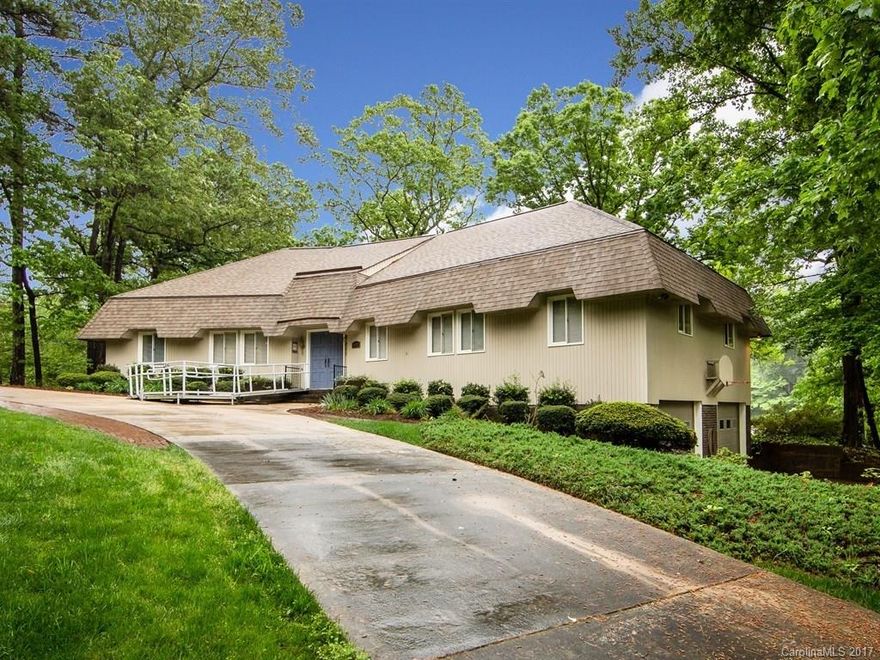 A Classic Tega Cay Waterfront! A sprawling ranch on 3 lots, over 3/4 of an acre & flat to water. The foyer is spacious complete with slate flooring. Panoramic view from the all seasons sunroom. Eat-in kitchen, DR, den & great room. Rip Rap wall, Pier & dock. Oversized 2 car garage, circular driveway, tons of parking. This is a one of a kind waterfront location.