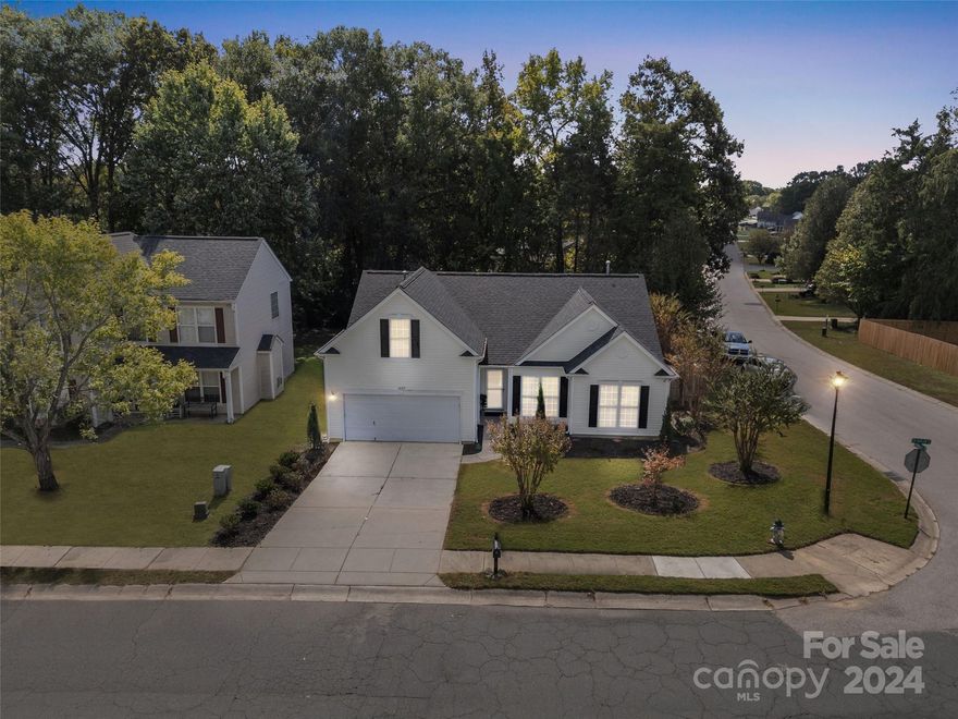 Welcome home to this perfectly renovated 1.5 story bungalow. All you need to do is pack your bags as everything else has been done for you! Fresh and modern paint throughout, completely renovated primary bath, and updated guest bath. Enjoy the custom trim work in the office, the high ceilings, the spacious kitchen, and multi-purpose bonus room above the garage. Step out into your backyard paradise complete with fruit trees, a brand new privacy fence, and extensive landscaping. NEW roof!