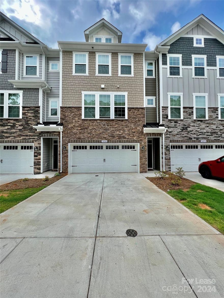 BEAUTIFUL and SPACIOUS 4 bedroom with 3.5 bath TOWNHOUSE located in BALLANTYNE is available for rent. Main floor  features a spacious bedroom with a full bathroom and  attached  2-car garage. Upper floor offers an open floor plan with a beautiful kitchen, granite countertops, stainless steel appliances, living and dining area, a walkout to deck and a powder room . Third floor offers a spacious master bedroom with 2 additional bedrooms, 2 full bath rooms and a laundry room. Easy access to shopping, groceries and restaurants. Come and see today!!
