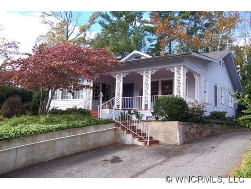 One of those charming classics of Tryon, in a neighborhood with similar period homes in easy walking distance to downtown, and a stone's throw from the library and Community Arts Center. Wood shake siding,front porch for rocking and a screened back porch all encompassed by a small but well landscaped/easy to maintain yard. Unique hardwood flooring, wood burning fire place, rooms are all well proportioned with abundant windows/natural light