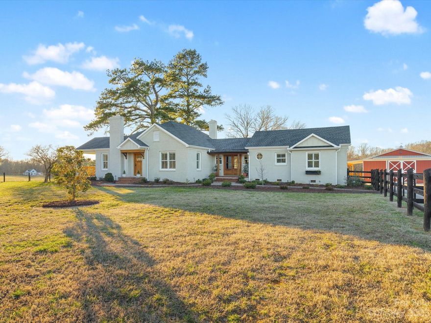 Welcome to 1032 Lawrence Road in Clover, SC! Experience the transformational charm of this classic brick ranch, revived in 2021 with jaw-dropping renovations, beautifully nestled on 6.3 fenced acres. Enter through French doors and explore the gorgeous 2,751 HSF where every corner holds a special discovery! Across the threshold you can unwind by the stone fireplace in the living room or craft a delightful meal in the gourmet chef's kitchen. This well-appointed kitchen features high-end appliances, spacious island, butler's pantry, and coffee/wine bar, seamlessly connecting you to the dining room. Tranquility awaits in the primary bedroom and bath, designed for ultimate rest and relaxation! Completing the interior are two additional bedrooms, two more bathrooms, laundry room, sunroom, and mudroom with a drop zone. Enjoy picturesque views from every window and porch of your manicured farm. Step outside to discover a 48'x36' barn, a lighted arena, and pasture-perfect for all your animals!