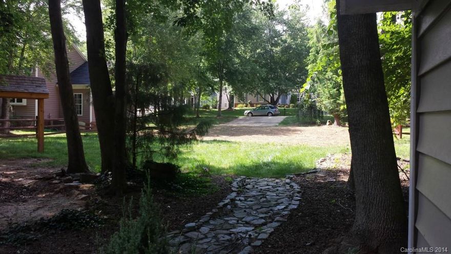 Unique rare opportunity in well developed community with full amenities.  Convenient to 485, 85, 77, Uptown, Mint Hill, Harrisburg, etc.  Lot already has the driveway, fence, landscaping, shed, pathways, access to walking trails with 1/3 acre on a cul-de-sac street.  Completely ready for you to start building and save money since so much is already there already.  Bring your own builder or use ours. Best of both worlds - already proven wonderful community with a brand new home!