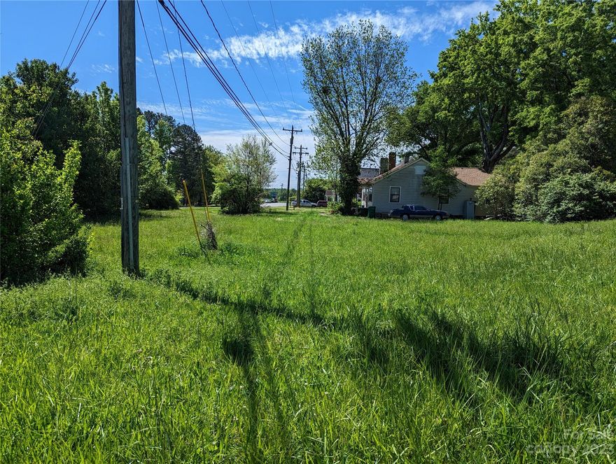 Fantastic opportunity for multi-family building on this level infill lot near the heart of Charlotte. Offered for sale is TWO parcels with frontage roads on front or back. Design your optimal income property in a trending neighborhood close to Tuckaseegee, Freedom Drive, major thoroughfares throughout the city. Variance already granted to increase buildable envelope. Here's your chance to get ahead of the curve!