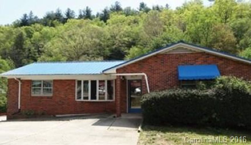 MOTIVATED SELLER - NEEDS TO MOVE. Perfect for small business or business/home, mini-farm, possibilities are endless. Beautiful property near the entrance of Pisgah National Forest with two streams. Zoned Mixed-Use, approx 4.2 acres including over 325 ft Road Frontage on NC 280 with strong traffic count (14,000 CPD per NCDOT traffic count). A short drive to downtown Brevard and only 15 minutes to Asheville Regional Airport. Please do not disturb tenant, contact listing agent for showing.