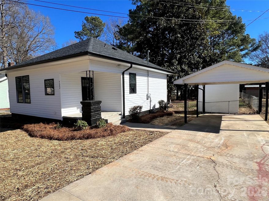 MOVE IN READY - recently renovated bungalow in established Albemarle neighborhood.  New roof, gutters, siding, windows, doors, HVAC, updated electrical and plumbing.  Practically buying a new house.  Open floor plan - combined Living Room, Dining Area and Kitchen, 2 bedrooms and central hall bathroom.  Large, fenced back yard and outdoor storage/utility building.  Convenient location to Hwy 52 and Hwy 73.  Fully permitted and completed by Licensed General Contractor - CO attached in media section.