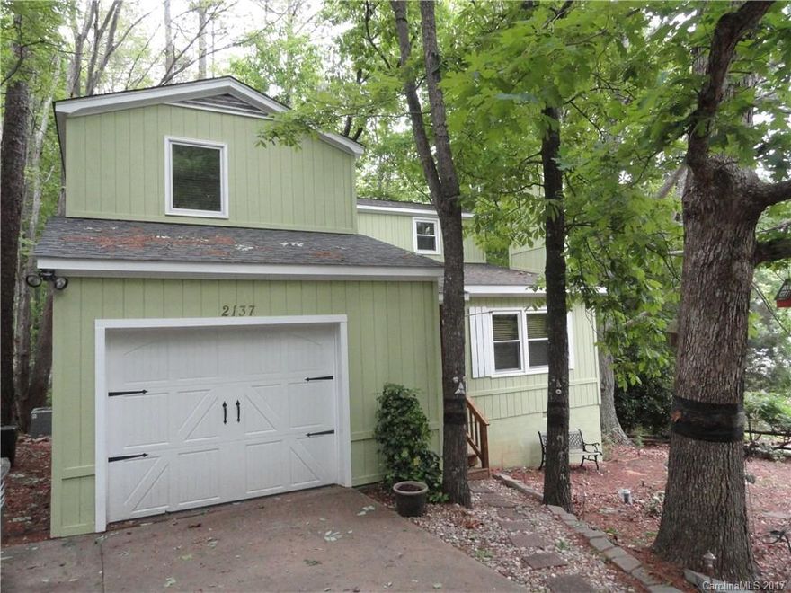 Fort Mill Schools! Peaceful wooded setting in Historic Tega Cay. Four Bedrooms, Master on Main, One Car Garage. Recent roof, windows, and HVAC.