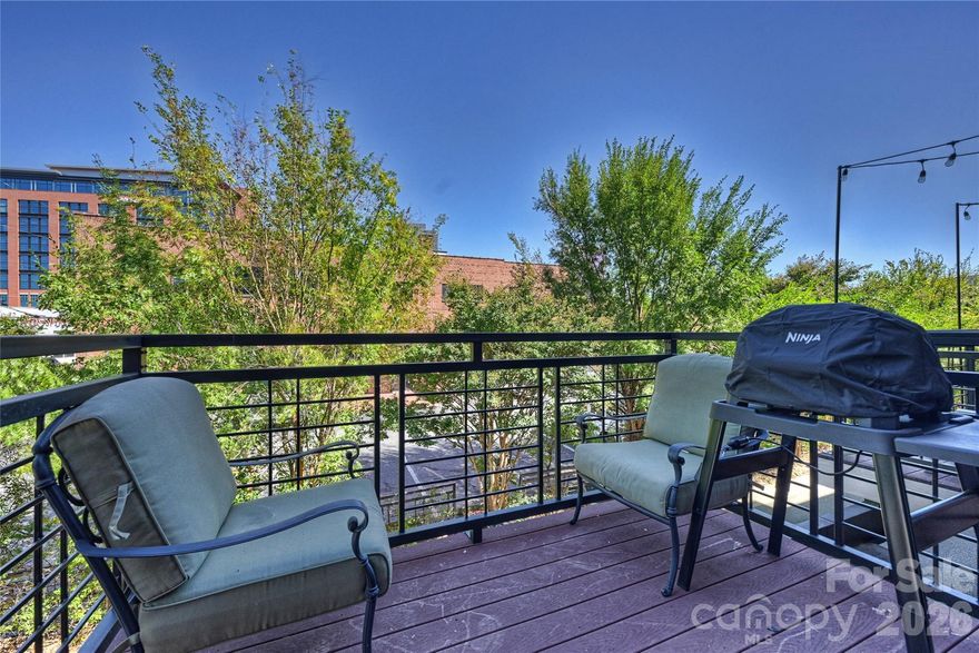 Experience South End living at its most connected—just steps from the Rail Trail, top restaurants, breweries, and everyday essentials, all right outside your door.

Positioned along the Bland Street Light Rail stop, this all-brick end-unit townhome offers a rare combination of walkability, natural light, and multiple outdoor spaces—creating a lifestyle that’s hard to replicate anywhere else in Charlotte.

The main living level is designed to feel open, bright, and connected. Large windows bring in natural light throughout the day, while two private balconies extend the living space outdoors—ideal for morning coffee, evening downtime, or simply taking in the energy of South End.

The kitchen has been thoughtfully updated with stainless KitchenAid appliances, granite countertops, and recessed lighting, flowing naturally into the dining and living areas to support both everyday living and entertaining.

Upstairs, two spacious bedrooms each feature their own updated ensuite baths, creating a flexible and comfortable layout for owners or guests. The entry level offers a third bedroom with a full bath—well-suited for a home office, guest suite, or fitness space.

Additional features include new wood flooring on the main level, updated bathrooms throughout, an attached garage with storage, and a low HOA—making this home as practical as it is well-located.

With Uptown skyline views, immediate access to the Light Rail, and some of Charlotte’s most popular destinations just steps away, this home delivers a true lock-and-leave lifestyle in the heart of South End.