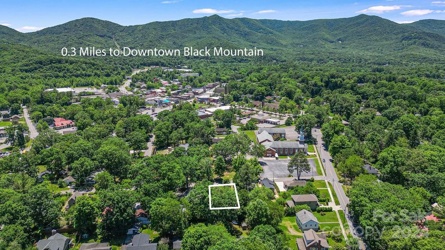 Discover the perfect canvas for your dream home in the heart of Black Mountain, NC. Located on 1st Street, this prime vacant lot offers a rare opportunity to build a custom home tailored to your preferences and lifestyle in a charming residential neighborhood. This level lot allows for a residence that can include a spacious yard with room and sunlight to garden, or simply relax in the serene surroundings.  Nestled within a friendly community, the location of this lot enhances everyday living with ease and convenience.  Just steps away, immerse yourself in the charm and beauty of Black Mountain Town Square. Living here means you are just a stroll away from local cafes, boutiques, art galleries and all the local flare.  City utilites are readily available for connection ensuring a smooth and efficent start to your construction process. Whether you're looking to invest in your future home or a developement project, this lot presents a blend of potential. Agent is related to seller.