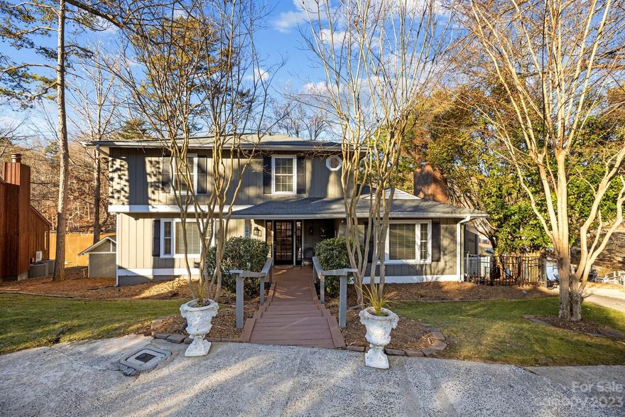 This beauty is back!  No fault to the sellers!  Homes Foor You presents...
Nestled in the charming community of Tega Cay, this exquisite lakefront property offers a serene retreat w/ unparalleled waterfront views. Step inside to discover a remodeled kitchen featuring high-end appliances, sleek countertops, & ample storage space. Imagine preparing meals while gazing out over the tranquil waters, creating a truly picturesque experience. Main level includes an office, family room, dining room, powder room & laundry room plus 2 pantries. Upstairs, you will find 4 bedrooms & 2 full bathrooms.  The custom outdoor kitchen and entertaining area with fire pit and “bar” area complete this dream location. Boating enthusiasts will appreciate the private dock, offering direct access to the lake for water activities and exploration.  Great for kayaking, paddleboarding, or simply enjoying the gentle lapping of the waves on the private beach area. BE SURE TO ASK ABOUT THE LIST OF ADDITIONAL FEATURES.