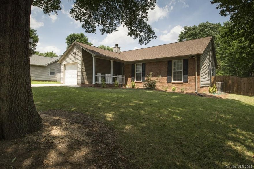 A gardeners dreams and this home is ready to move into! Fabulous ranch style home with open floor plan, Updated Kitchen with granite counters, SS appliances and flat panel cabinets.  Within last 5 years, windows replaced, roof and gutters, new appliances installed, replaced fence, garbage disposal and hot water heater. Breakfast nook leads out to a beautiful oversized deck with brick pavers, and newly stained. Beautiful flat yard surrounded by new fence and beautiful landscaping waiting for you.
