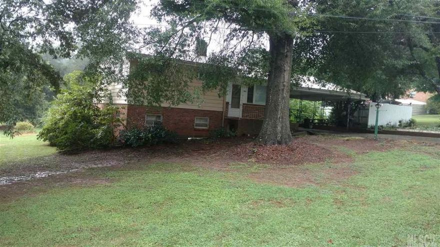 Quiet neighborhood, Large 1.48 acres lot, outbuilding/workshop is wired. 2 car attached car port. NO city tax! Partial fenced backyard. On a no outlet street. Convenient to Hwy 16 and 10 and I-40