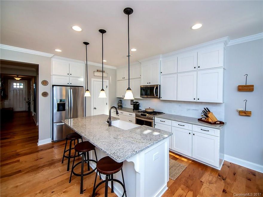 $20,000 LESS than BUILDING plus sellers added 10k worth of upgrades. Brand new home that has only been lived in for a few months! Lot's of unique features in this home including a new double gas oven, updated fixtures, and a custom built-in master closet & hardwood stairs. Check out the home & get a feel for this friendly neighborhood. Brayden has amenities that include Private Residents’ Club w/a competition pool, neighborhood pond, walking trails & parks. Even prettier in person!