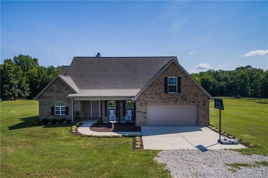 This gorgeous 1.5 story, open floor plan, on apx 10 acres, that backs up to year round Stony Fork Creek could be your dream home. Bring your horses, chickens and goats! Apx 5 acres is fenced with some areas sectioned into smaller pen areas. Granite kitchen counter-tops, custom cabinets, all bedrooms down. This move-in ready home has family room and office upstairs. 10 minutes to York Preparatory Academy. If you are searching for a nice home with acreage, this is A MUST SEE!
