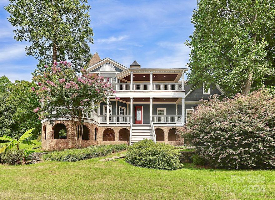 Southern-style custom home nestled in Mountain Isle Harbor, a prestigious waterfront community on Mountain Isle Lake. This elegant two-story home, approx. 4K sqft (3,413 heated/723 unheated), features 4 bedrooms, 3.5 bathrooms on a spacious 0.49-acre corner lot w/a beautiful panoramic view patio! The interior has a fresh coat of paint, updated bathrooms, refinished hardwood floors, new carpets, and a new AC system!

Main floor boasts a gourmet kitchen w/10-foot ceilings, granite countertops, large island, formal dining & breakfast rooms, living room w/ fireplace, office space. Upstairs, the primary bedrm w/an ensuite bathrm, tray ceilings, gas fireplace, private access to the tower patio, 3 add’l rooms, 2 full baths. Basement walkout to patio ready for entertaining!

Mt. Island Charter School district, proximity to new waterfront restaurants, retail shops, highways. Gorgeous home ready for any designer's touch! Agent-owned and sold as-is; buyers to verify details. Motivated Seller!