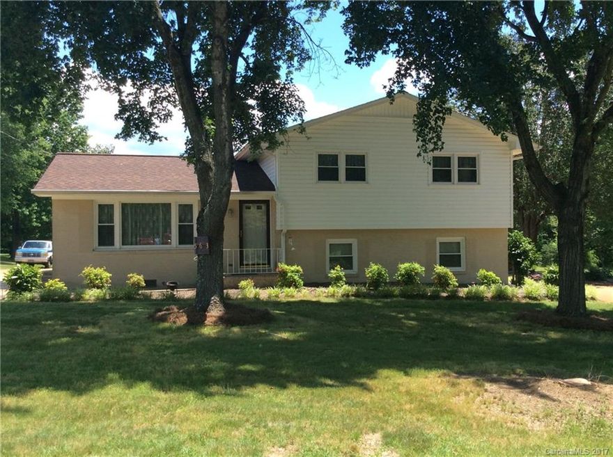 Spacious 4 bdrm home on 3 parcels totaling 1.5 ac in quiet established neighborhood. Mooresville Graded Schools.  Light colors, hardwds under carpet upstairs, lg kitchen, mature trees, sizable patio and tons of yard to enjoy evenings outside, entertaining, or room for that garden you always wanted. Updates include roof 2012, windows/siding, doors/gutters 2013,  HVAC/ duct work 2014.  Most costly upgrades completed, home well maintained and ready for new buyers's decorating ideas. Come see today!