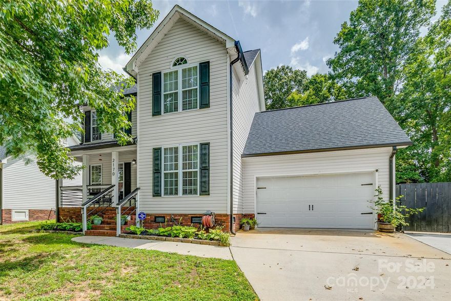 Welcome to your dream home, where modern sophistication & on-trend design blend seamlessly. Step into your new home, beginning with the inviting charm of a covered front porch. Come inside & see the open layout featuring a gracious living area with luxury LVP flooring, with a chic electric fireplace and on-trend feature wall that adds warmth & style. The heart of the home, the kitchen, is equipped with ss appliances and a neutral backsplash. Discover the beautifully remodeled secondary bath with 3 generous bedrooms & 2.5 bathrooms. Step outside, to your back deck with a fire pit, perfect for gatherings. With modern aesthetic updates, this home also features practical upgrades & features, including an architectural shingle roof, oversized gutters, newly installed insulation in the crawl space & a garage attic. With stunning upgrades inside & out, this beautiful home offers both luxury & practicality. Do not miss the opportunity to make this beauty your own!