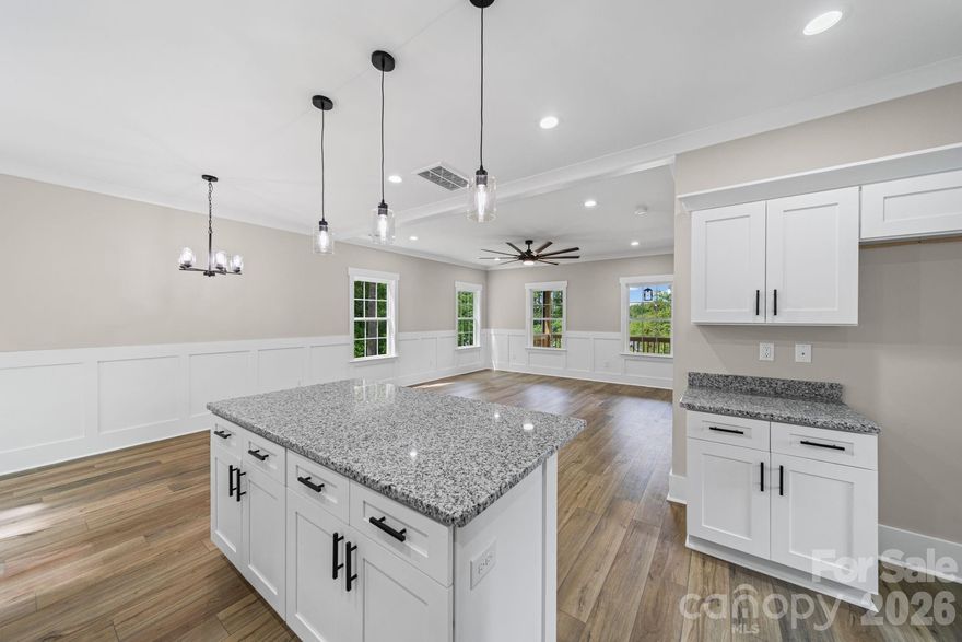 Beautiful new construction home with views of Badin Lake! This 3BR/2.5BA home features an open floor plan, a spacious kitchen with a large island, wood cabinetry, and detailed trim throughout. The primary suite includes a private ensuite bath and custom closet.
Relax or entertain on the inviting front porch while enjoying views. This is not a basic build—there are numerous upgrades throughout the home.
Located near the 5,350-acre Badin Lake and Uwharrie National Forest, offering boating, incredible wildlife, and endless outdoor adventure. Ideal for full-time living, a weekend retreat, or a vacation rental opportunity.
Conveniently located near Old North State Marina for fuel and Scallywags waterfront restaurant, known for great food and live music. Don’t miss the area’s popular Fourth of July lake celebration featuring the boat parade and fireworks.
Within one hour of Charlotte and the Triad. USDA eligible, offering a potential 100% financing option. No HOA.
Photos/virtual staging are from a similar build. Professional photos coming soon.
Circle Drive public boat ramp is located nearby for easy access to the lake for your boat and water toys. Get ready to enjoy summer on the lake!