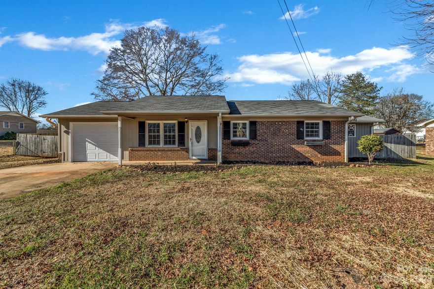 Charming one level home in desirable residential neighborhood. This well maintained three bedroom, 2 bath home features an open living room, dining area, and updated kitchen. Plenty of parking plus a one car garage. Spacious primary bedroom with ensuite bath offering a walk-in shower, garden tub, and double vanities. Private fenced in back lawn with an above ground swimming pool, 2 decks, and a storage building. It is perfect for kids play, pets, or that garden you've been wanting. Located less than 10 minutes from downtown Forest City with it's shops, restaurants, and entertainment. Call to schedule a showing today.