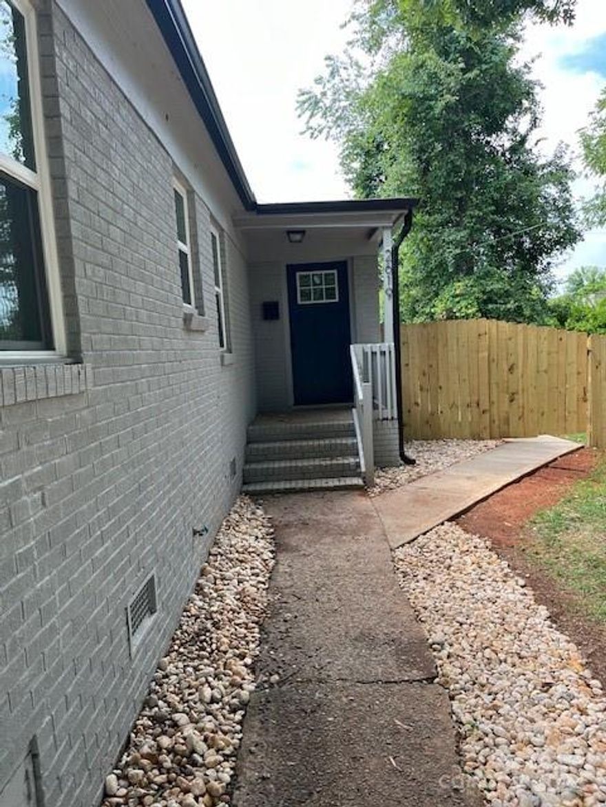 Welcome to this beautifully renovated 3 bedroom, 1 bathroom, just a short drive from the vibrant uptown Charlotte. With its fresh paint, new LVP flooring, new cabinets, granite counter tops and stylish fixtures throughout. The spacious living area is perfect for gatherings. Stove, refrigerator, stackable washer/dryer included. Each of the three bedrooms offers comfortable space, natural light and ceiling fans. The updated bathroom provides a clean and crisp feel with tile surrounding the tub, fenced in back yard a 10x10 deck and a tankless water heater to provide unlimited hot water.