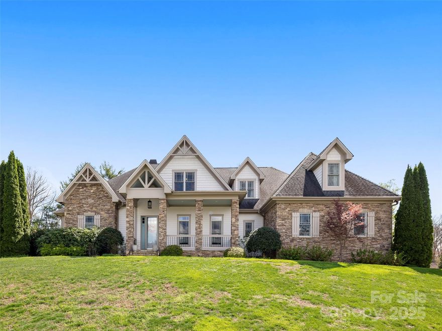 Tastefully updated, spacious and well maintained in King Heights, conveniently located in South Asheville. This home has a very thoughtful layout with incredible outdoor space. The high ceilings and abundance of windows provide great natural light throughout the home. Open living space has a cathedral ceiling, a gas fireplace flanked by built-ins and beautiful hardwood floors. The updated kitchen has a huge island, double ovens, a gas cooktop and plenty of storage. Main level primary suite is a sanctuary with 2 walk-in closets, soaking tub, walk-in shower, built-ins and a wet bar. There is an additional bedroom, full bathroom and den on the main level. Upstairs has an another en-suite bedroom, split bedrooms, with a shared full bathroom, and several bonus/flex rooms. Outdoor space consists of a covered and screened back deck, concrete basketball/play area, level yard space, a hot tub and fire pit. Plenty of parking with the 3 car garage and additional space in the driveway.