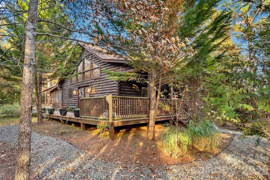 FIONA'S FOREST HAVEN is FOR SALE! Located in the quiet gated community of HEARTHSTONE RIDGE just North of Rutherfordton NC and only a short drive from Lake Lure, Chimney Rock, Tryon, Hendersonville, and Asheville. It is a very quiet area with paved roads and a gravel driveway leading through the woods to this well-appointed two-bedroom, 1.5-bath log cabin, perfect to relax, unwind, and enjoy nature. 

***You'll enter the front of the cabin from the wrap-around deck, through French doors, into the spacious great room. The fully functional kitchen has everything you need to prepare your meals. There is ample seating in the dining area that adjoins the kitchen. Just off the dining area is the relaxing living room, complete with a wood-burning stove for those extra chilly nights. There is a large laundry room with a washer and dryer right off the kitchen, leading to a lovely, screened porch perfect for your morning coffee or an after-dinner glass of wine. A gas grill sits just outside the screened porch for easy access to the kitchen. A lovely fire pit and outdoor sitting area complete the backyard. 

***The Main Bedroom accommodates a King bed and large walk-in closet and is just off the living room. A Jack-and-Jill bathroom with a tile shower separates the Master Bedroom from the Guest Bedroom.

***The back/side yard is completely fenced in for those with pets.  Secluded from the street and any neighboring properties, provides peace and tranquility.

***Just a minute's drive away is HEARTHSTONE PARK, where you will find swings, a basketball goal for some exercise, picnic tables, a gazebo by the creek, and a covered pavilion for large gatherings. The neighborhood is complete with a quarter-mile nature trail and walk that reveals a gorgeous view of Mount Mitchell and the Western North Carolina Blue Ridge, a jewel in the crown of the Appalachian Mountains.   

***Currently on a Vacation Rental program with Carolina Properties in Lake Lure.