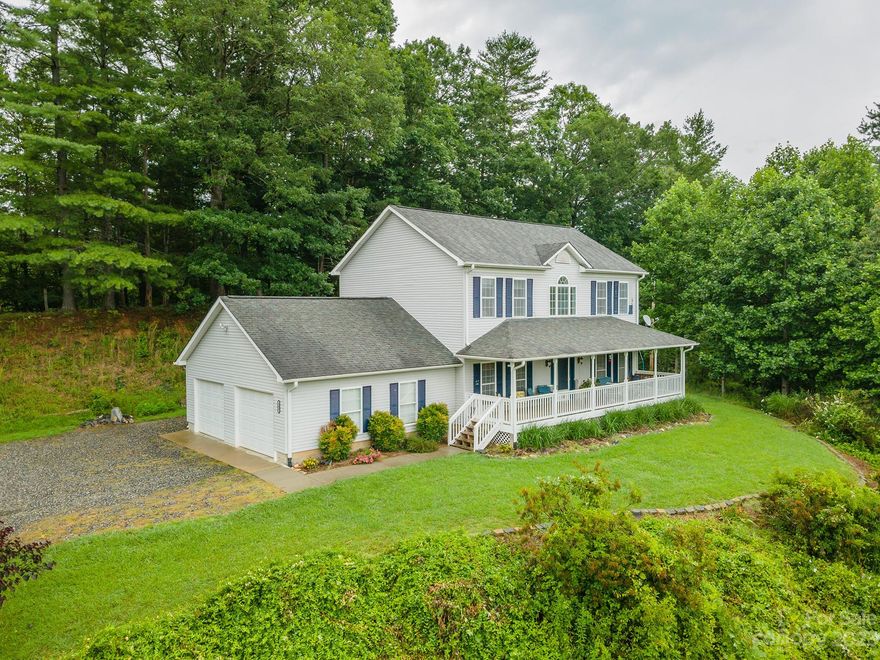 Enjoy the tranquility of your huge front porch with long range mountain views, you may even see horses and cattle  on nearby pasture, or deer in your own front yard! This home is very private and sits on almost one acre of hilly and level land, surrounded by acres and acres of rolling pasture.  Main Level Features: Den w/bonus room, Large Foyer entry, Gas fireplace in Great Room, Half Bath, Laundry Room, Spacious Dining open to a beautiful kitchen with island, breakfast bar and newly destressed cabinets. Upper Level: Three bedrooms, Two full baths, office with closet, Master has lots of light and view of mountains, garden tub and walk in shower, walk in closet.  Crown Molding throughout. Furniture is negotiable.
