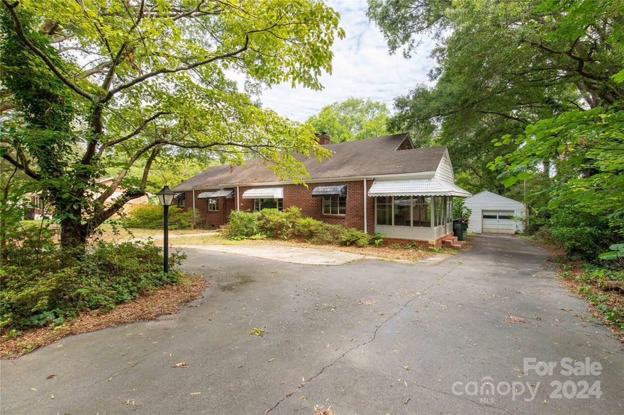 Welcome to a charming residence in the heart of Rock Hill, South Carolina. This delightful 2-bedroom, 2-bathroom home exudes classic charm with its cozy and inviting atmosphere. The spacious living room features large windows that bring in abundant natural light, creating a warm and welcoming space for relaxation. The kitchen, while retaining its vintage appeal, offers ample cabinetry and counter space for your culinary needs. The master bedroom serves as a peaceful retreat with its comfortable layout and attached bathroom. There is an additional room that could be used as a 3rd bedroom or huge master closet. The expansive backyard is perfect for outdoor activities, gardening, or simply enjoying the serene surroundings. Situated in a friendly neighborhood, this property is conveniently located near schools, parks, shopping, and dining options. With its timeless charm and comfortable living spaces, this is a  a wonderful place to call home. Don’t miss this opportunity to make it yours!