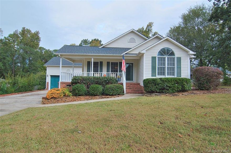 Open-concept bungalow w  covered front porch. Hardwoods throughout the living room, dining area & kitchen. Kitchen features upgraded kitchen features granite & high-end appliances in a airy living space with lots of natural light. Open floor plan allows for an easy flow from room to room in the main living area. Spacious bedrooms. Large master suite w master bath offers a soaking tub as well as his & her sinks. Large back deck overlooking fenced in and level back yard for a more private feel.