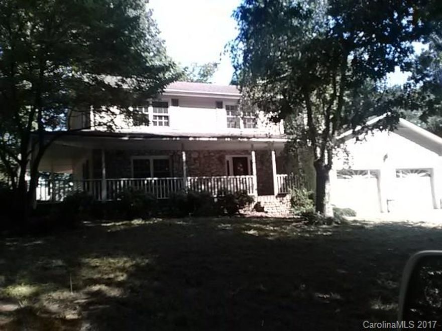 3 bedroom, two and half baths with large yard and wrap around porch! Being sold "As is, Where is"