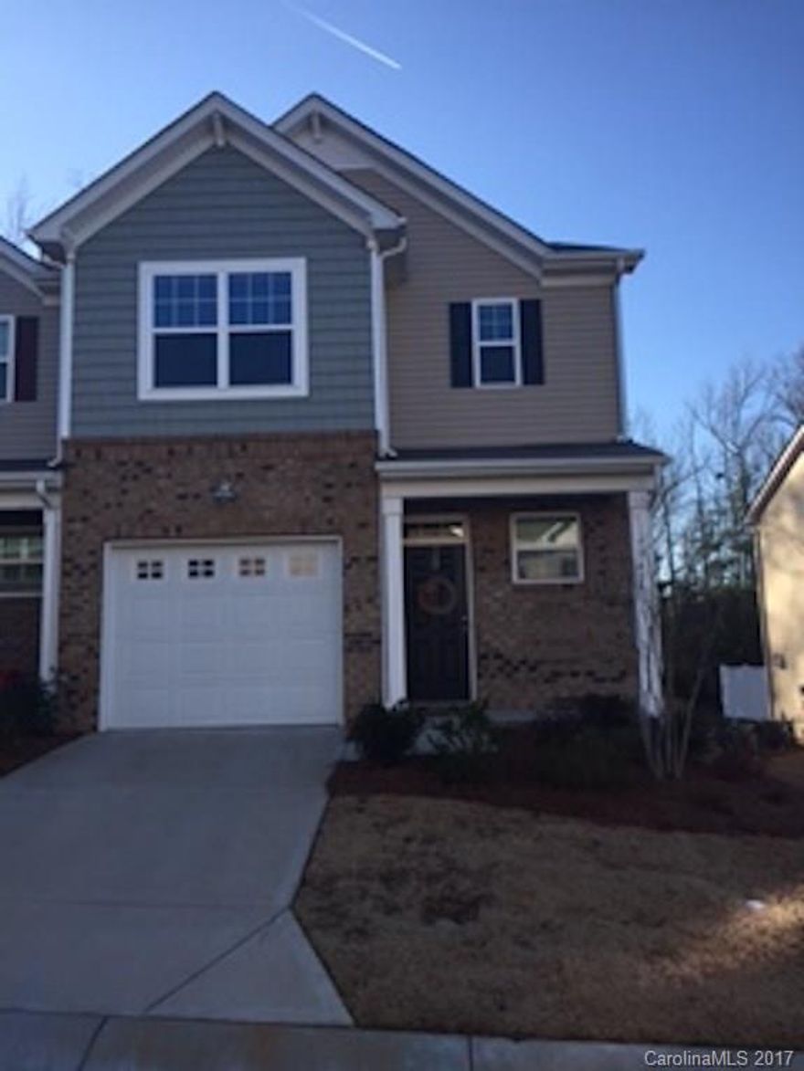 Almost new spacious end-unit townhouse with 3 bedrooms and 2.5 baths. Private patio with wooded view. Kitchen features stainless steel appliances, granite countertops, hardwood floors, pantry and breakfast bar. Two bedrooms, Master with walk-in closet, Master bath with separate shower and soaking tub upstairs. Great location!