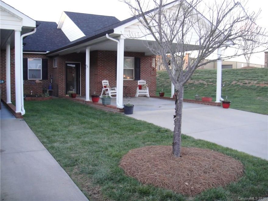 2 Bedroom, 2 Bath all brick home located in the desirable Terraces in Denver. This is an end unit with a beautiful and spacious private yard. Lots of upgrades, all granite counter tops.  Meticulously maintained. All that you could want and hope for in this 55 and up community. Well thought out and open floor plan.