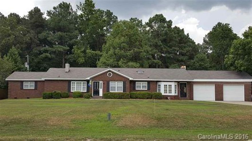 Large 4 bedroom home with 2 1/2 baths, large den with vaulted ceiling and fireplace, sliding glass doors that open up onto a private patio.  Formal living rm with fireplace and home has formal dining area.  Bonus rm that could be play area, or workout room.  All this and the home has over 2 acres.