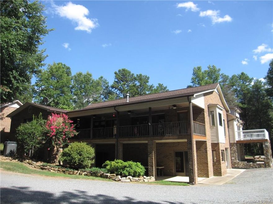 Looking for privacy with an abundance of nature?  This gated enclave of homes is situated just outside MP city limits.  Ranch/Basement sited on 4+acres has extremely open design & private Master addition.  Daylight bsmt & 3rd garage bay, offers extended living scenarios.  Circle drive encompasses home w/many outdoor spaces overlooking neighboring pond.  Bright, light-filled GR/Kitchen/Dining space.  Stunning Master retreat & outstanding bath!  This property is just what your Buyer has described!