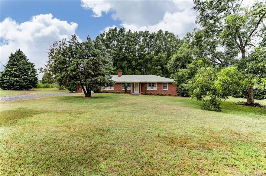 4 Bedroom Brick Ranch Home on 1.54 acres w/no HOA! 4 bedrooms,2 full baths, living room, family room w/stove, kitchen, screened porch, one car attached garage & carport. Storage shed has water & electric. Home is being sold as is. Seller will make no repairs. Roof was replaced,2004. Heat pump is about 10 yrs old. The green outbuilding in the rear of the property is not part of this parcel. Investors & Buyers wanting a little project, come take a peek & make this your next home!