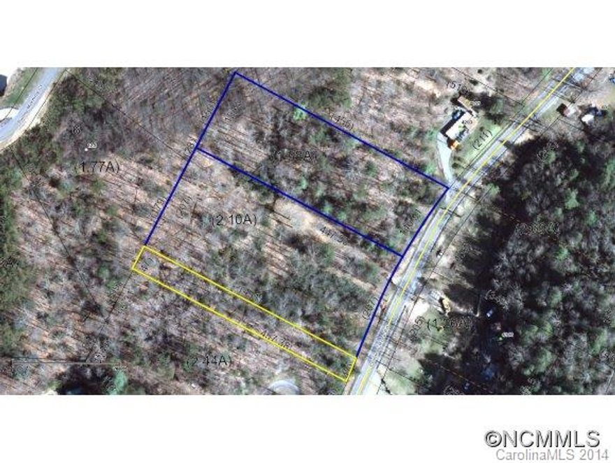 Beautiful 4.17 mostly wooded acres with paved driveway to open & level building site, natural springs on the property, stream and ultimate privacy. Offering over 400 feet of paved road frontage across three separate parcels all included in this listing; also includes parcel numbers  & . An excellent opportunity to buy and build a home or homes, modulars & manufactured homes permitted. Don't miss this one!