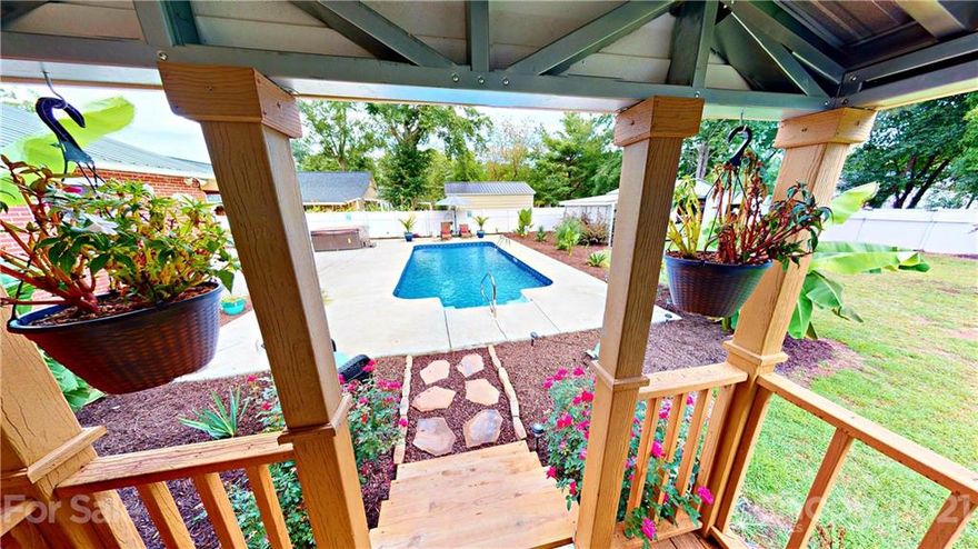 Remodeled home from the inside - out. What a beauty... 3 bedroom, 2 bath, in-ground 2 year old pool, pool house, another storage building, deck, new metal roof, 3 year old HVAC, new wiring, kitchen, master bedroom/bathroom & laundry room added. This one won't last long.