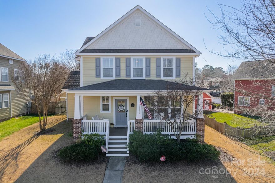 Welcome to this beautiful turn-key home in the sought after Vermillion neighborhood! As you enter, you'll be greeted by the inviting front porch where you can sip your morning coffee or unwind in the evening. In through the foyer, you'll see the formal dining room to the right and living room straight ahead. The open concept living room and updated kitchen with a butler's pantry are an entertainer's dream. Speaking of entertaining, step out back to discover an oversized covered deck with a wood-burning fireplace, perfect for hosting large gatherings year round! Upstairs, the primary suite boasts a spacious walk-in closet and a garden tub with separate shower. Two additional bedrooms and a full bathroom complete the second level. The exterior of the home is just as amazing as the interior, featuring Palisades Zoysia Sod and a detached 2 car garage. Other updates include brand new HVAC, newer water heater, and freshly painted interior and exterior siding. You won't want to miss this one!
