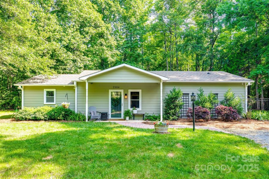 Charming 3-Bedroom Gem on One Acre in Rock Hill! Welcome to your own slice of country living—just minutes from the heart of Rock Hill! This adorable 3-bedroom, 2-bathroom home sits on a peaceful one-acre lot and is full of charm and thoughtful updates. Inside, you’ll love the open-concept layout, perfect for entertaining. The updated kitchen flows seamlessly into the main living area, and the primary suite offers an amazing ensuite bathroom that feels like your own private spa. Step outside and enjoy life on your terms: relax on the front or back porch, gather around the fire pit, or tinker in the shed. The fenced backyard offers room to play, garden, or just soak up the Carolina sunshine. With country charm, modern updates, and a prime location in Rock Hill, this one checks all the boxes!