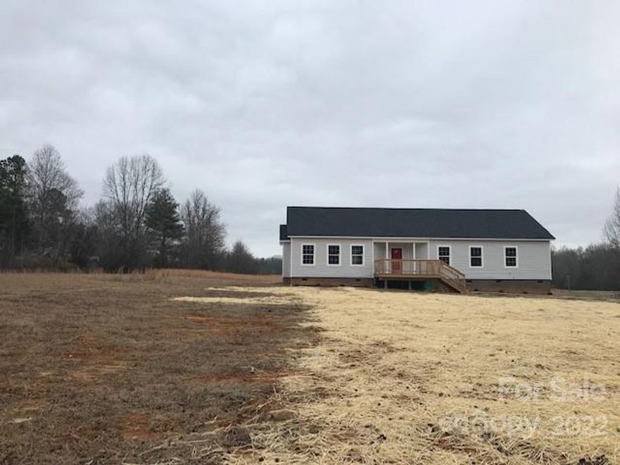 Beautiful off frame modular. Country setting with room to grow with over 3 acres. Level lot, imagine the possibilities. The home includes nine foot ceilings throughout, foyer, kitchen center island, recessed lights, owners bed/bath with garden tub and walk-in shower, over sized closets in the secondary bedrooms, walk-in pantry, neutral colors. The property is currently being removed from a parent parcel. The dwelling is a 2017 model home that has never been lived in. Per the owner the following items are new to the property. New HVAC and duct work, new sub-flooring, new flooring, new plumbing underneath, new lighting fixtures, new interior doors, new kitchen oven, new well, new septic, new foundation, new decking, new insulation, new siding, new soffit and fascia coverings.