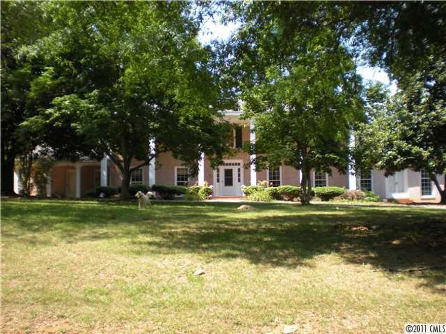 PRICE REDUCED AND PRICED TO SELL! Southern Style Mansion nestled on 10+ acres with Horse Pasture & Gazebo Feeding Station. Reduced $50,000 to $199,900 from $249,900 September, 2014. Prestigious Entrance Columns & Concrete Circular Driveway leading to Large Covered Porch. Selling "As Is." Refrigerator does not remain. A real taste of Southern Flair. Must see to appreciate. Extra large rooms plus 3 car Garage. Quiet country setting in the Town of Denton close & convenient to Restaurants & Shopping