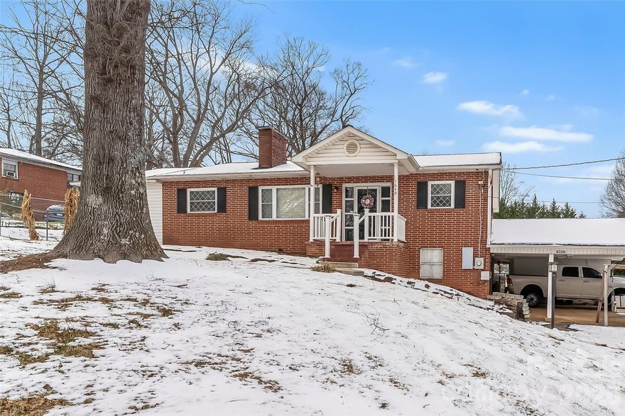 Charming home in a great Newton location! This spacious property features beautiful hardwood floors, generously sized bedrooms, and convenient main-level laundry that could also serve as a den or flex space. The full basement offers a garage door and plenty of room for storage or a workshop. Enjoy the large fenced backyard perfect for pets and outdoor living. Great layout, great area, and tons of potential!