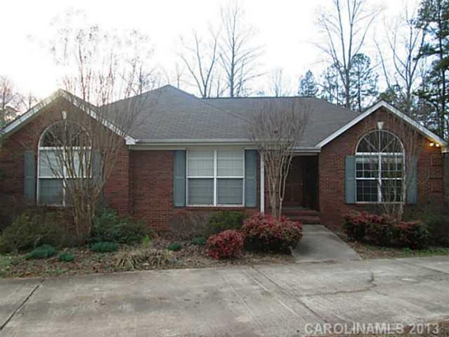 Motivated Seller!! Full Brick with Basement on 1.68 Acre Lot with Adjoining 1.0 acre Lot Now Included for the Same Price!! Total Acreage of 2.68 Acres!!  3 Bedroom, 3 Bath, Great Room with Built Ins and Fireplace, Living Room, Screened in Porch and Deck off Back.  Garage in Basement and Plenty of Room to Grow in the Unfinished Full Basement.  Located off Hwy 150 and near Lake. Lot is partial of above referenced tax ID #.
