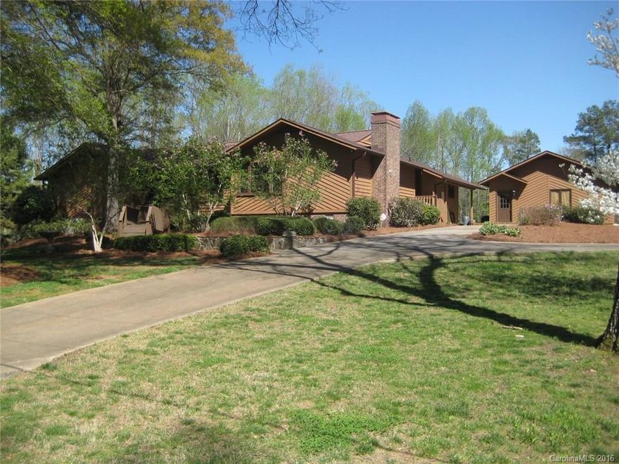 Stunning cedar siding ranch located on the golf course, beautiful prefinished HW flrs, kitchen updates (2008), gas stove (approx 3 yrs old), Bosch DW, Butlers pantry remodeled in 2010, family room w/stone fireplace & wet bar w/fridge (2010), sunroom w/prefinished HW flrs, windows replaced approx (2012), HVAC & duct work (2012), 2 car garage (2005), storage building w/upstairs (2010), plumbing & electrical (2010).