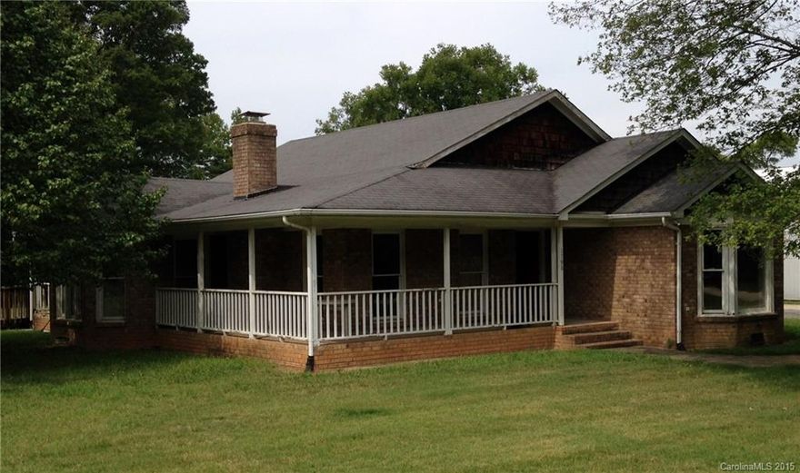 Bank-owned Foreclosure listed ~$60k below County assessed value! Single Family Conversion.  Nearly limitless possibilities with C2 zoning! One-story, handicap accessible w/ spacious Master bedroom, separate shower & jacuzzi tub, his/her sinks, large walk-in closet & more incl hardwoods, built-in entertainment center, breakfast nook, fireplace, wrap-around/covered porch, huge front/back yard.  Lots of parking.  Could be office, business, or investment! Minutes from downtown. Easy access to I-85!