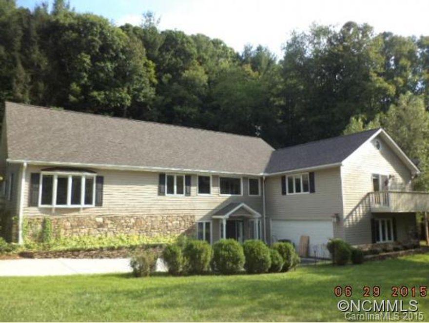 Relax on the wrap around deck or screened in porch as you watch the year around creek run by. Great room with floor to ceiling stone fireplace and family room with built-in bar. Master bedroom on each level. Bonus loft for home office. Mature landscaping, fire-pit. gazebo. Guest cottage with porch. Spring and city water. Just outside city limits. See attachment for PAS requirements and WFHM offer submittal information in MLS document section.