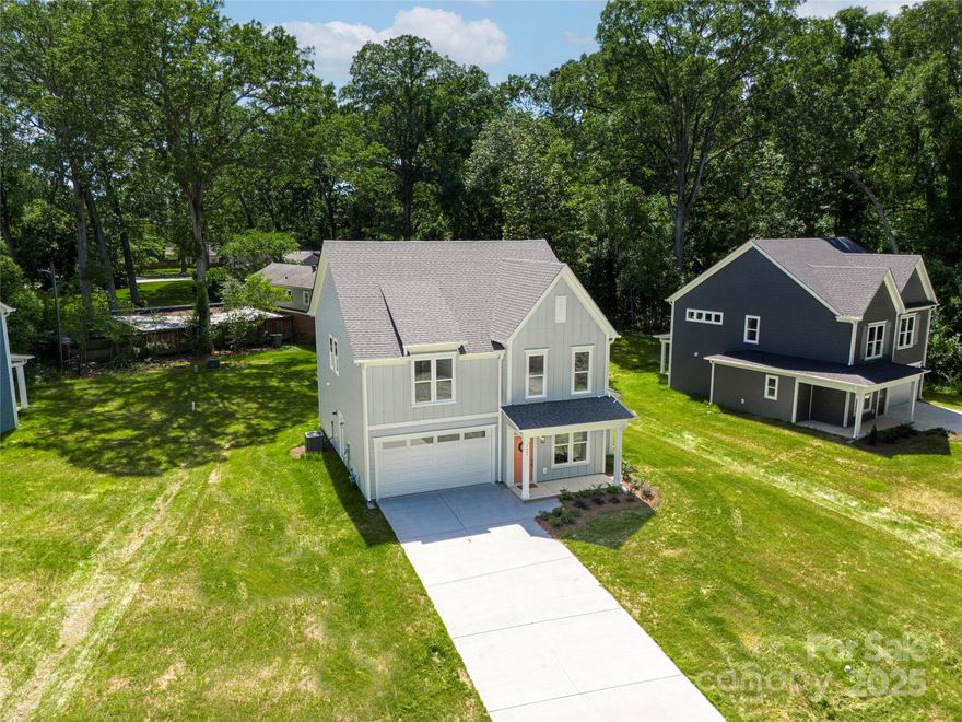 NO HOA!! Brand new custom built home offers space, style, & thoughtful upgrades throughout. This is not a tract built home, the quality & superior craftmanship are evident as you enter the front door. Granite counters, LVP flooring on the main level & tiled bathrooms, for a clean, modern finish. Open bright white kitchen, dining & living areas flow together beautifully, perfect for entertaining. The primary suite features a tray ceiling, walk-in closet, & spa-like bath with dual sinks & a tiled shower. Upstairs also includes laundry room, spacious secondary bedrooms, & a huge loft area which could also be converted to another bedrm if needed. Built for efficiency & comfort, this home includes spray foam insulation & a tankless water heater. Step outside to a covered rear patio & flat backyard perfect for relaxing, gardening, or play. Set on a quiet street conveniently located just off S New Hope Rd, just minutes to shopping, restaurants, I-85 & the hospital. Offering seller paid closing costs!