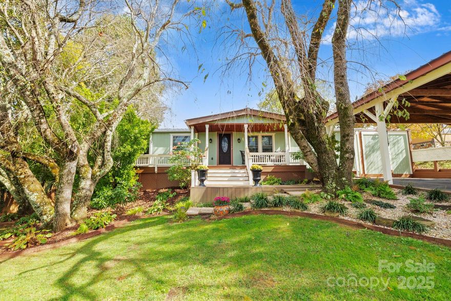 Completely remodeled home in a peaceful rural setting featuring a metal roof, new siding, and all-new luxury vinyl plank and new carpet flooring in sunroom. Updated kitchen with brand-new appliances. Enjoy outdoor living with three-level decks and a custom carport. Move-in ready with modern upgrades throughout.