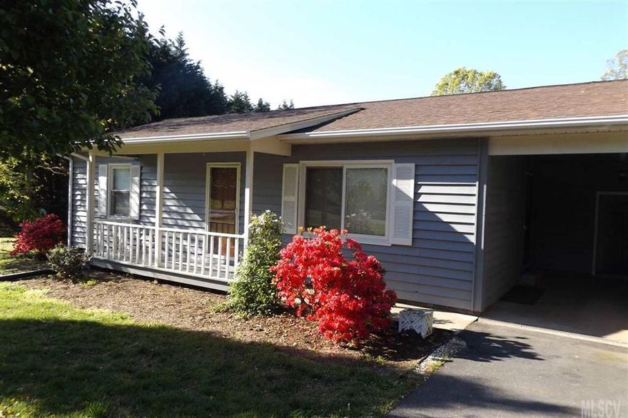 Exterior just painted ! Check out the recent updates inside including new cabinets, new countertops, new carpet, new paint, new dishwasher & microwave, hardwoods in Den & Kitchen.  This one is move in ready! Great location, nice yard, storage building, paved driveway with attached carport, and back deck.  New gutters, new soffits, and new pump in well. Tax value does not reflect recent upgrades.