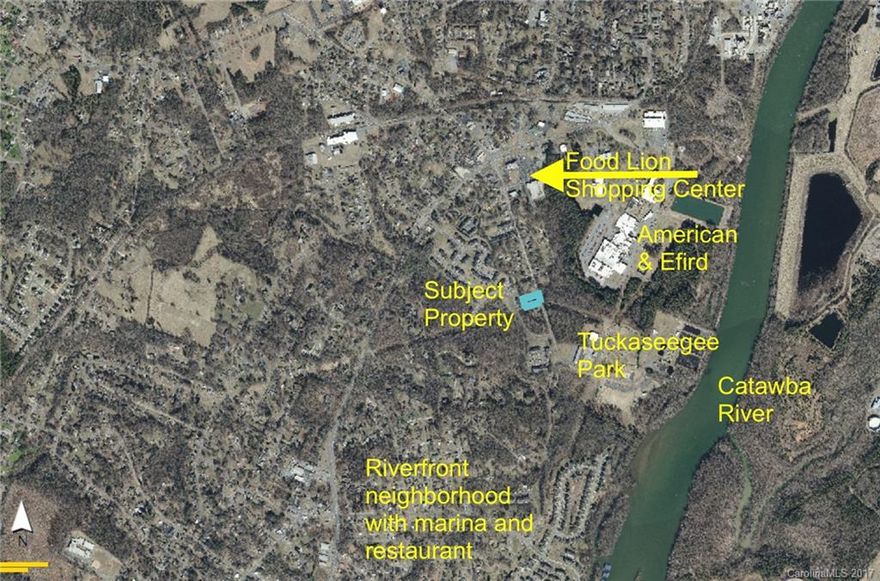 Rare find - buildable lot with multi-family potential, close to Riverfront marina and restaurant, public park and shopping.  Utilities available.